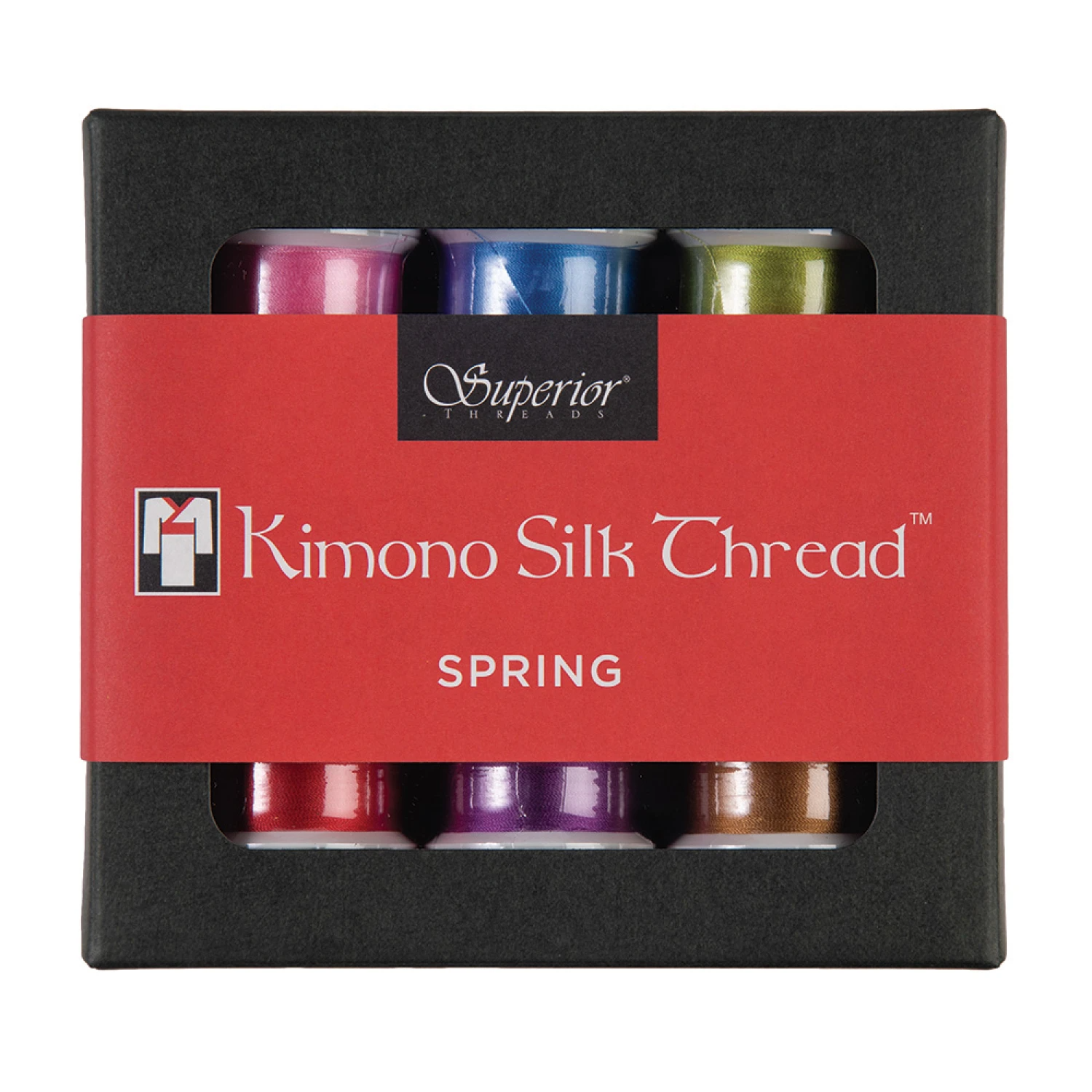 A box of Superior Company Kimono Silk Thread in the 'Spring' colorway, featuring six spools of thread in pink, blue, green, red, purple, and brown, wrapped in a red paper band.