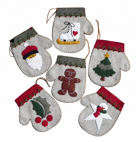 Six festive felt Christmas ornament mittens arranged on a white background, each with a different holiday design including Santa, ice skates, gingerbread man, Christmas tree, holly, and snowman.