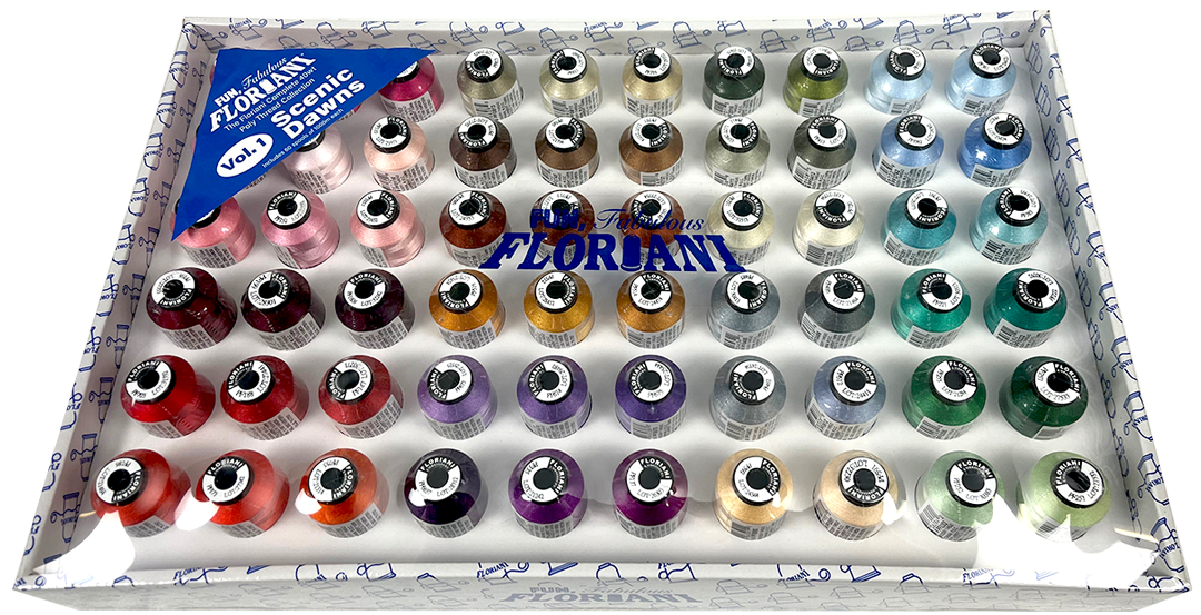 Collection of fabric thread spools in various colors on a branded tray.