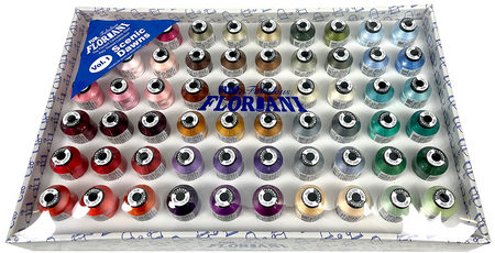Collection of fabric thread spools in various colors on a branded tray.