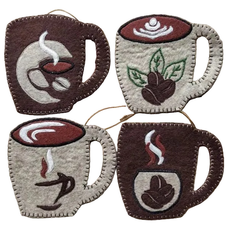 Four felt coasters with coffee cup designs on a wooden surface.